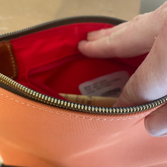 New Never used Dooney & Bourke Crossbody Pouchette light orange - Picture 3 of 4